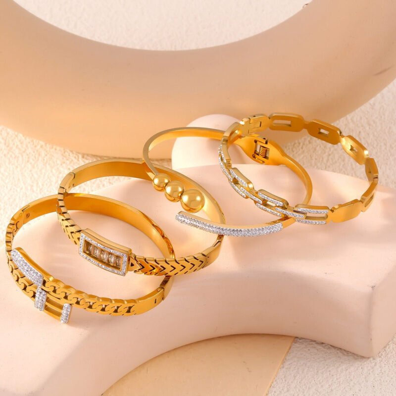 18K gold exquisite fashion inlaid gemstones and diamonds with hollow design bracelet